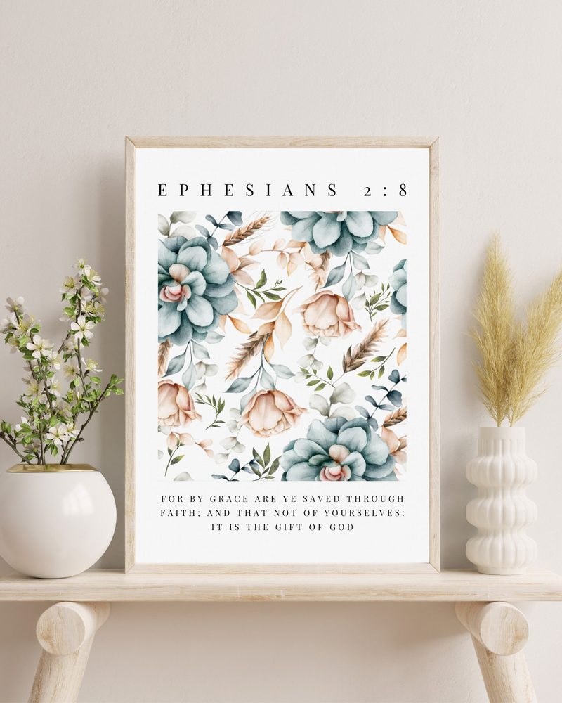 Ephesians 2:8 KJV peach rose wall art — the print in a red oak frame, on a white shelf with blossom