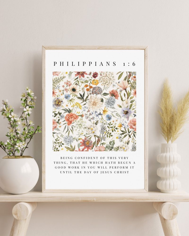 Philippians 1:6 KJV wildflower wall art — the print in a red oak frame, on a white shelf with blossom